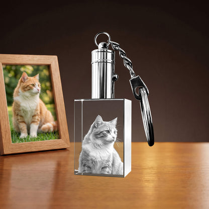 Rectangular crystal keychain with a cat portrait.