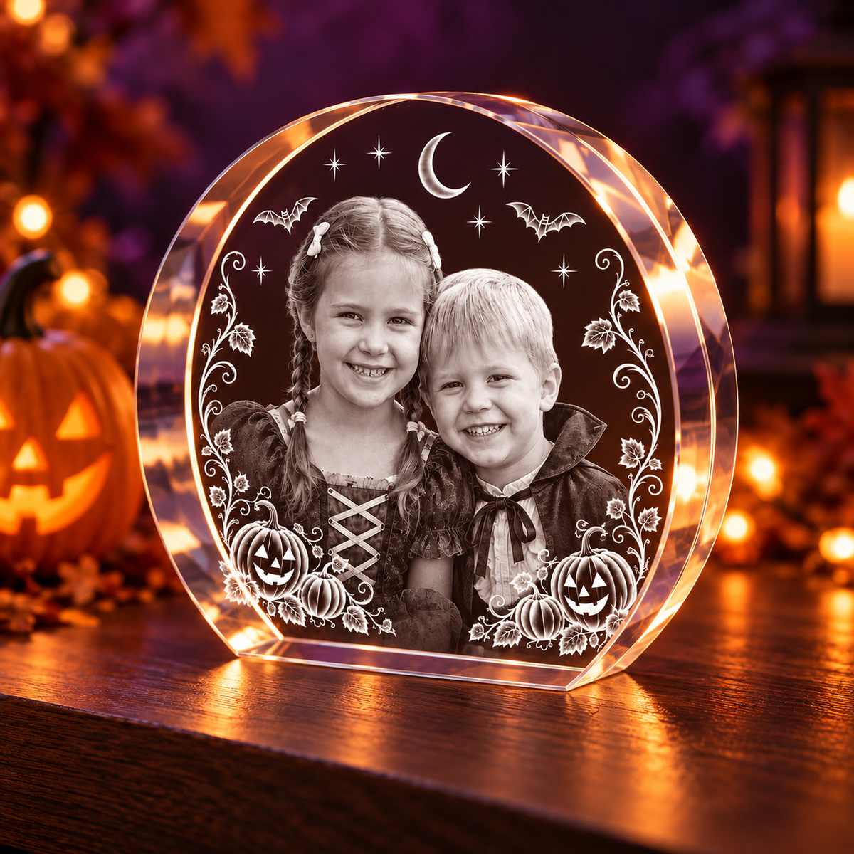 3D Crystal Round Stepped Disc Halloween Photo Gift in a pumpkin and amber-light Halloween setting, alternate view