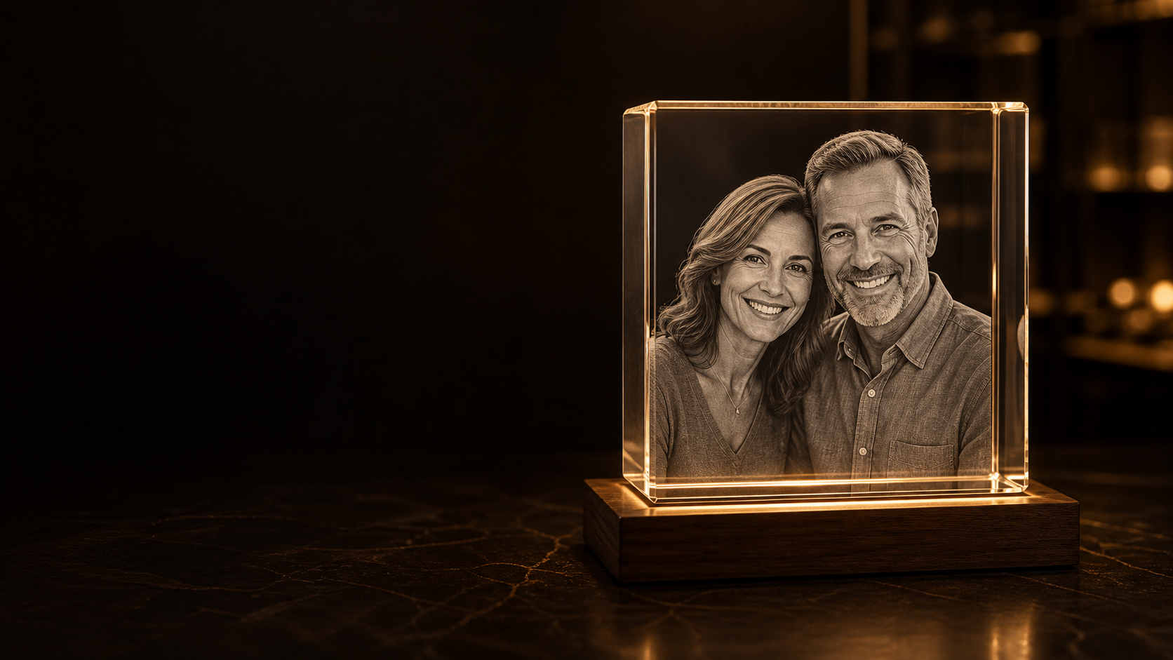 A personalized crystal portrait of a smiling mother and father